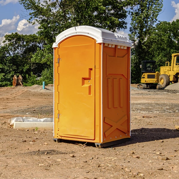 how often are the porta potties cleaned and serviced during a rental period in Reyno